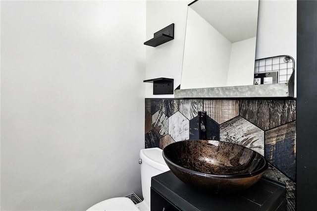 527 S Filmore St, Covington, LA 70433 - bathroom with toilet and vanity