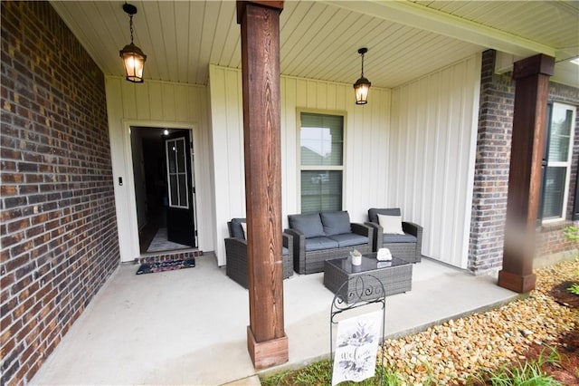 entrance to property with brick siding, an outdoor hangout area, board and batten siding, and a porch