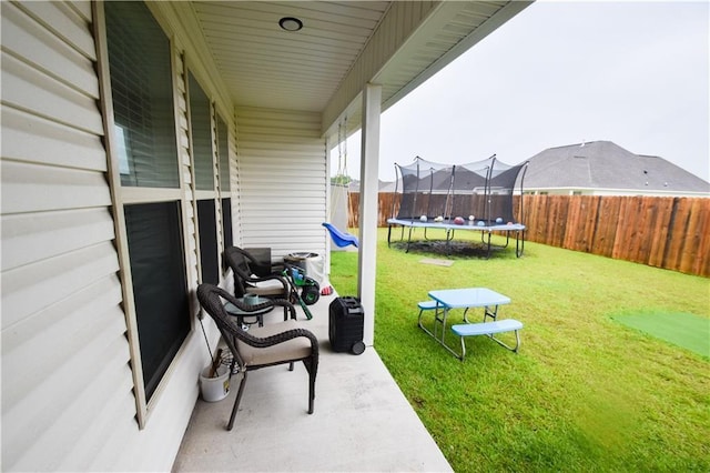 view of yard featuring a trampoline