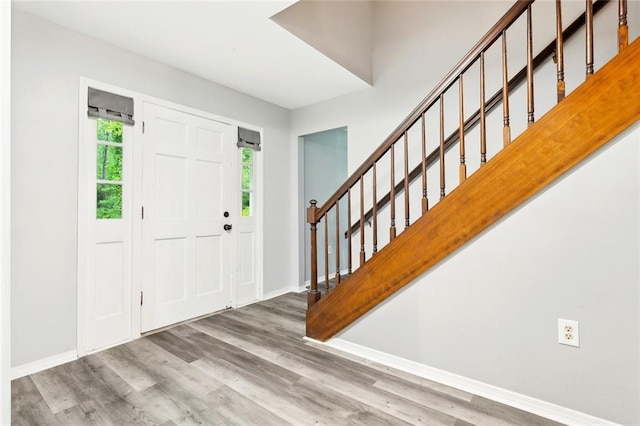 19635 Sunshine Ave, Covington, LA 70433 - entrance foyer with wood finished floors and stairs