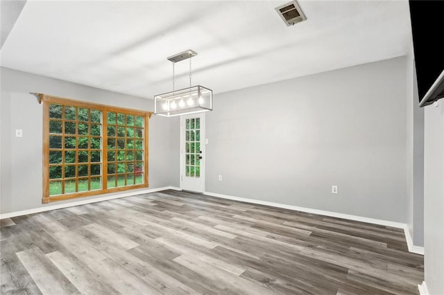 19635 Sunshine Ave, Covington, LA 70433 - unfurnished dining area with wood finished floors and baseboards