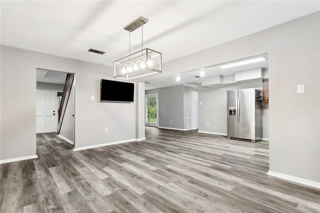 19635 Sunshine Ave, Covington, LA 70433 - unfurnished living room with wood finished floors