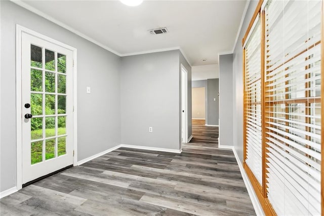 19635 Sunshine Ave, Covington, LA 70433 - empty room featuring plenty of natural light, ornamental molding, and wood finished floors