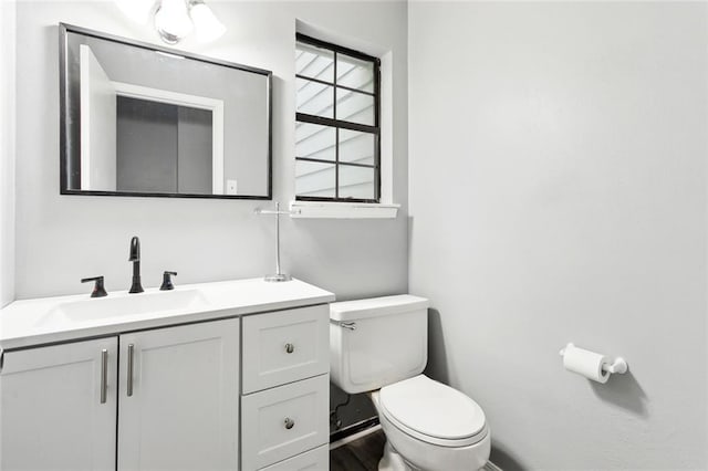 19635 Sunshine Ave, Covington, LA 70433 - bathroom with toilet and vanity