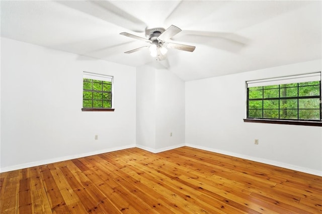 19635 Sunshine Ave, Covington, LA 70433 - unfurnished room featuring hardwood / wood-style floors, a ceiling fan, and vaulted ceiling
