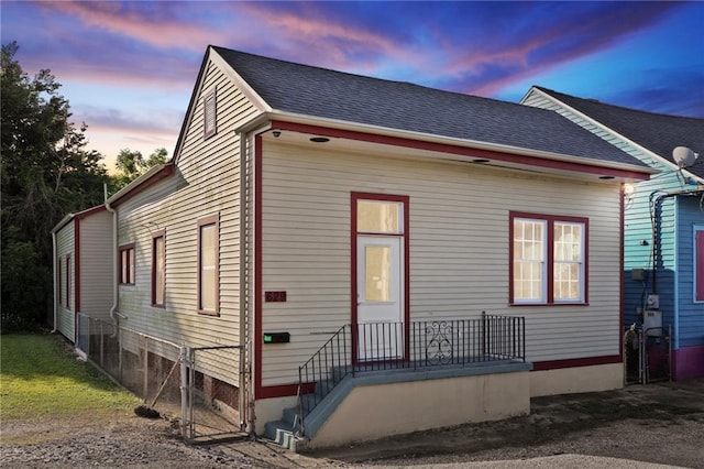 629 Lesseps St, New Orleans, LA 70117 - view of front facade with roof with shingles