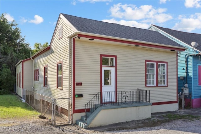 629 Lesseps St, New Orleans, LA 70117 - view of front of property featuring a shingled roof