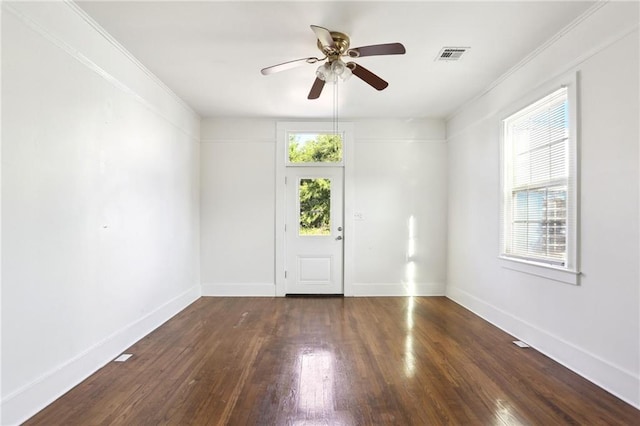 629 Lesseps St, New Orleans, LA 70117 - empty room featuring wood-type flooring, a ceiling fan, baseboards, and crown molding