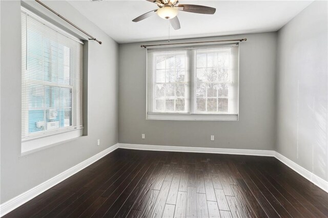 629 Lesseps St, New Orleans, LA 70117 - unfurnished room with a ceiling fan, hardwood / wood-style flooring, and baseboards