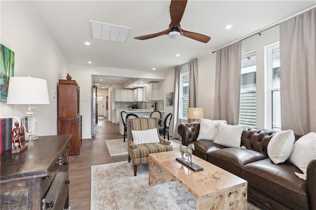 240810 Saint Anthony St, New Orleans, LA 70119 - living area with wood finished floors, a ceiling fan, and recessed lighting