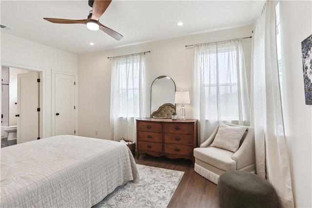 240810 Saint Anthony St, New Orleans, LA 70119 - bedroom featuring wood finished floors, multiple windows, ensuite bath, recessed lighting, and a ceiling fan