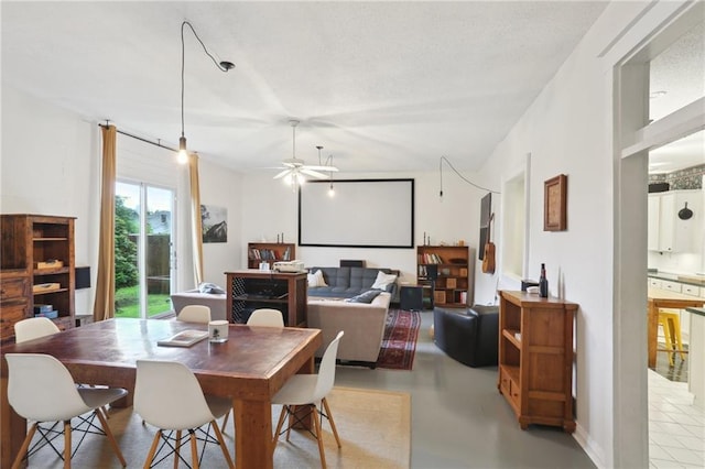 2224 Dumaine St, New Orleans, LA 70119 - dining space with ceiling fan and concrete floors