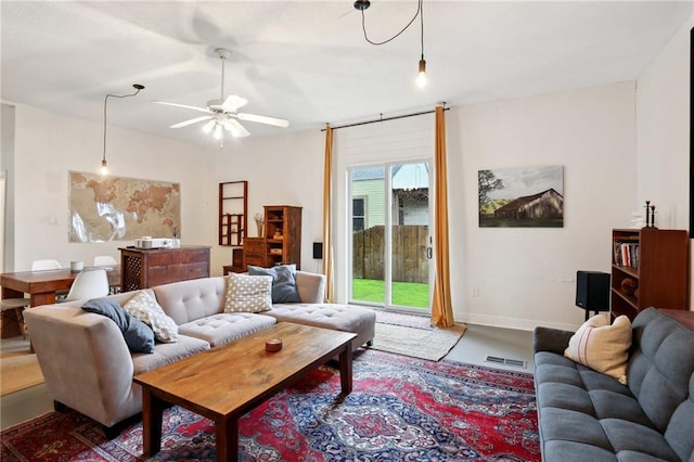 2224 Dumaine St, New Orleans, LA 70119 - living room with a ceiling fan and baseboards