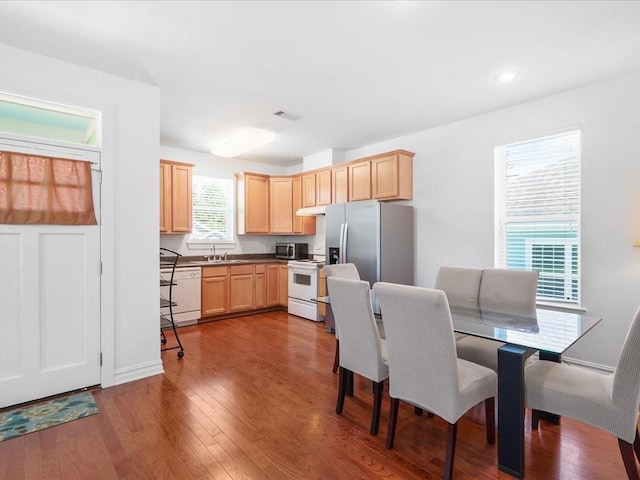 5840 Eads St, New Orleans, LA 70122 - dining space with dark wood finished floors and recessed lighting