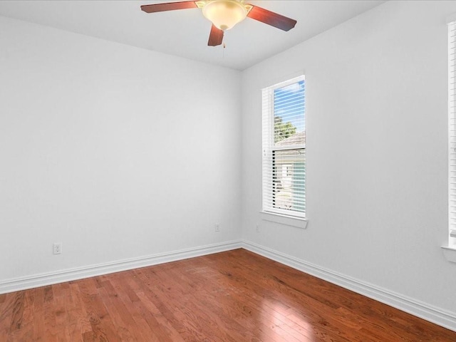 5840 Eads St, New Orleans, LA 70122 - spare room featuring wood finished floors and ceiling fan