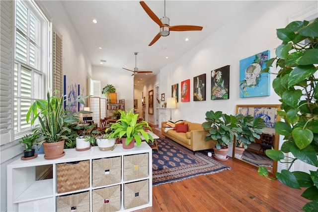 3217 Dauphine St, New Orleans, LA 70117 - living room with a ceiling fan, wood finished floors, and recessed lighting
