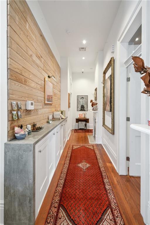 3217 Dauphine St, New Orleans, LA 70117 - corridor featuring light wood-style floors