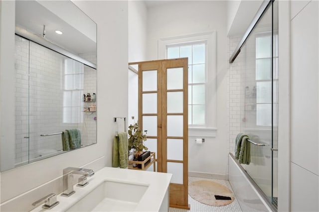 3217 Dauphine St, New Orleans, LA 70117 - bathroom with vanity, baseboards, and tile patterned flooring