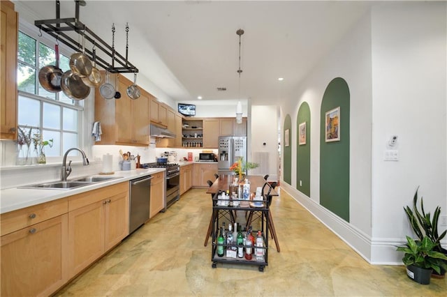 3217 Dauphine St, New Orleans, LA 70117 - kitchen featuring stainless steel appliances, under cabinet range hood, a sink, open shelves, and light brown cabinetry