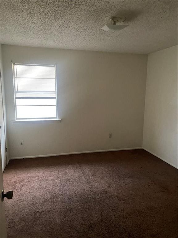 533 Evangeline Ct, La Place, LA 70068 - unfurnished room featuring carpet flooring, a textured ceiling, and baseboards