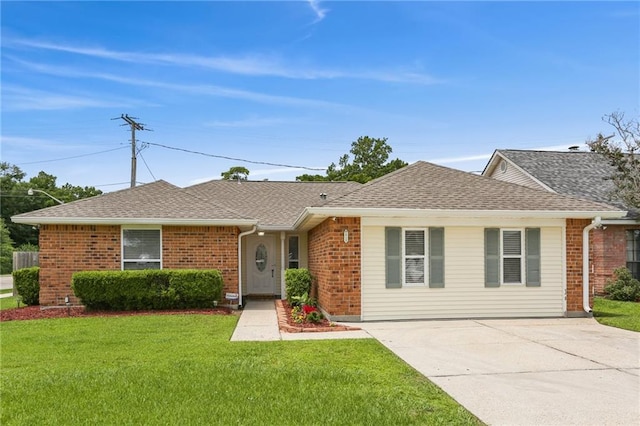 2728 Sprig Dr, Marrero, LA 70072 - ranch-style house featuring brick siding, a front yard, and roof with shingles