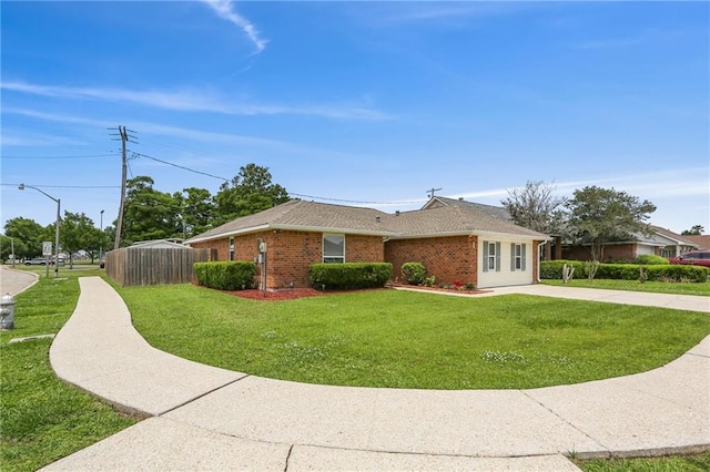 2728 Sprig Dr, Marrero, LA 70072 - view of side of home with brick siding and a shingled roof