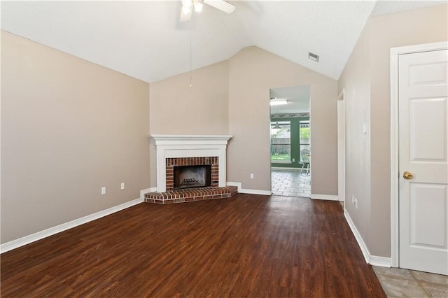 70342 5th St, Covington, LA 70433 - unfurnished living room featuring lofted ceiling, wood finished floors, a ceiling fan, a fireplace, and baseboards