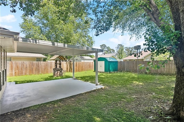 70342 5th St, Covington, LA 70433 - view of yard featuring a patio, a shed, and an outdoor structure