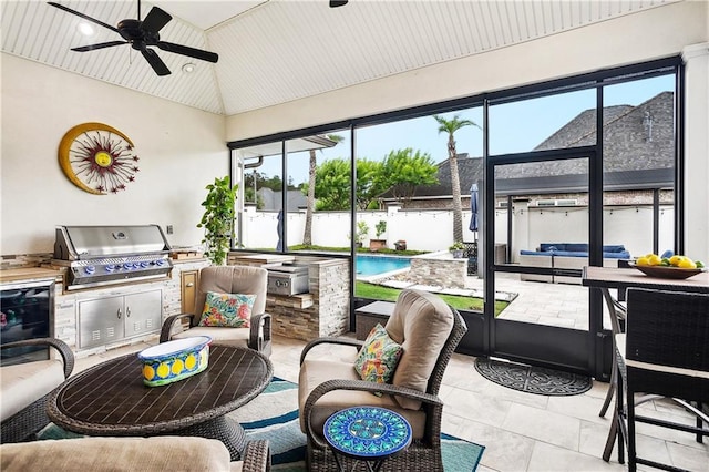 486 Cercle Du Lac, Covington, LA 70433 - sunroom with an outdoor living space, exterior kitchen, ceiling fan, healthy amount of natural light, and lofted ceiling