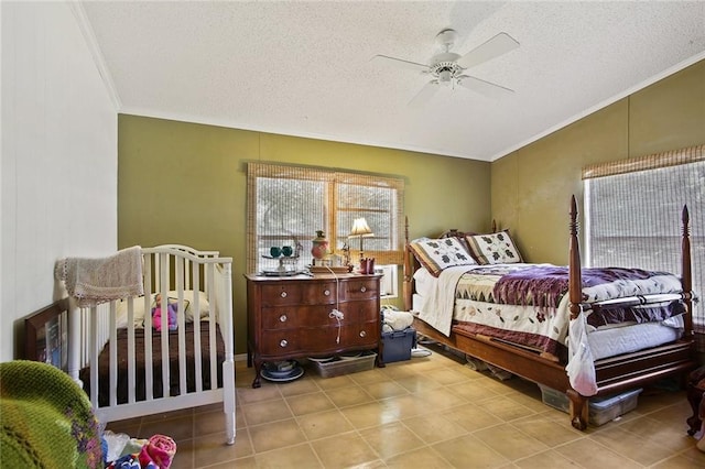 16768 Kat Kaw Rd, Franklinton, LA 70438 - bedroom featuring ornamental molding, a textured ceiling, vaulted ceiling, ceiling fan, and tile patterned flooring