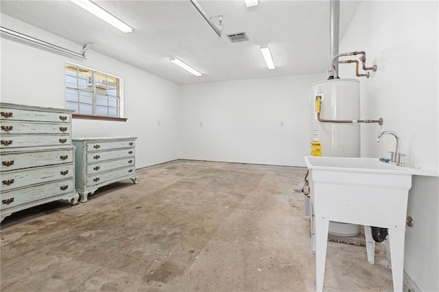 garage featuring water heater
