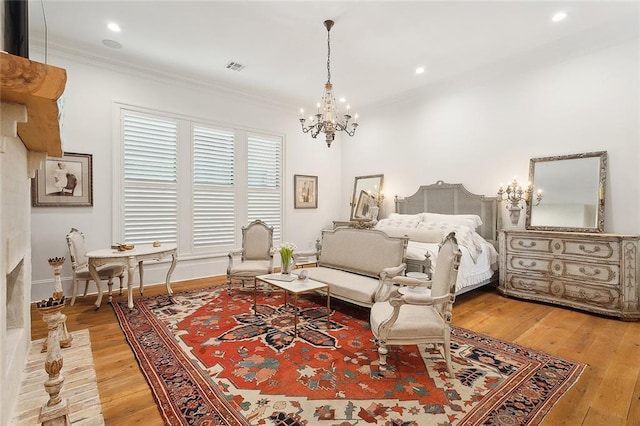 181 Windermere Way, Madisonville, LA 70447 - bedroom featuring a chandelier, crown molding, hardwood / wood-style flooring, recessed lighting, and baseboards