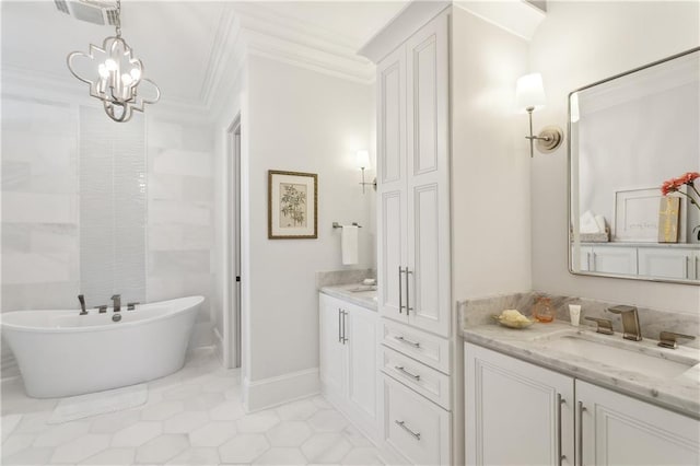 181 Windermere Way, Madisonville, LA 70447 - bathroom with crown molding, vanity, a freestanding bath, tile patterned floors, and a chandelier