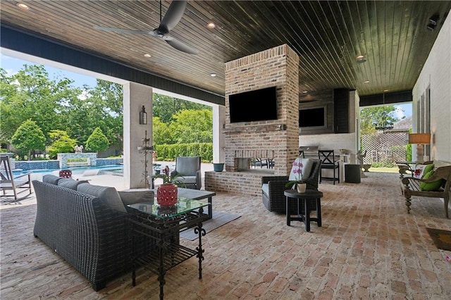 181 Windermere Way, Madisonville, LA 70447 - view of patio / terrace with an outdoor brick fireplace, ceiling fan, and an outdoor pool