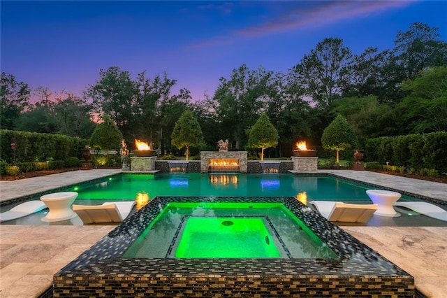 181 Windermere Way, Madisonville, LA 70447 - pool at dusk with an in-ground hot tub and an outdoor pool