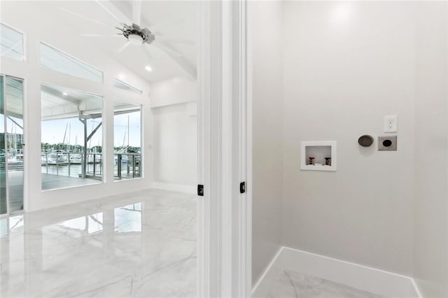 8116 Breakwater Dr, New Orleans, LA 70124 - laundry room featuring hookup for an electric dryer, marble tiled flooring, hookup for a washing machine, a water view, and baseboards