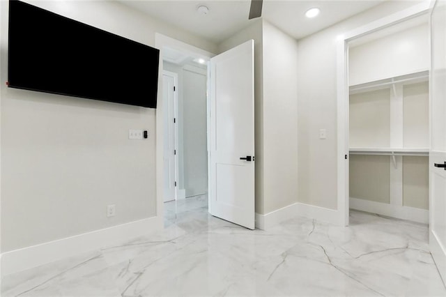 8116 Breakwater Dr, New Orleans, LA 70124 - unfurnished bedroom featuring marble finish floors, baseboards, a closet, and recessed lighting