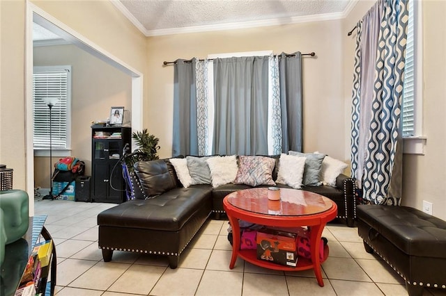 934 Brooklyn St, New Orleans, LA 70114 - living area with ornamental molding, tile patterned floors, and a textured ceiling