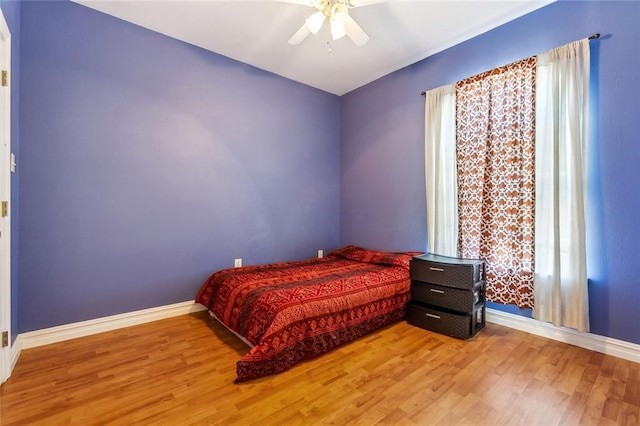 3945 Jean Lafitte Pkwy, Chalmette, LA 70043 - bedroom featuring wood finished floors, baseboards, and ceiling fan