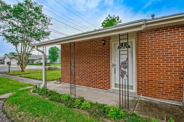 8209 Harris Ave, Harahan, LA 70123 - entrance to property with brick siding and a yard