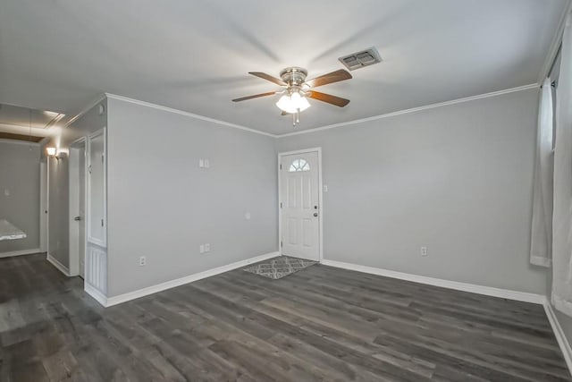 8209 Harris Ave, Harahan, LA 70123 - spare room featuring attic access, ceiling fan, dark wood-type flooring, baseboards, and ornamental molding