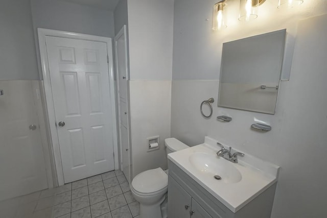 8209 Harris Ave, Harahan, LA 70123 - bathroom featuring vanity, toilet, and tile patterned floors