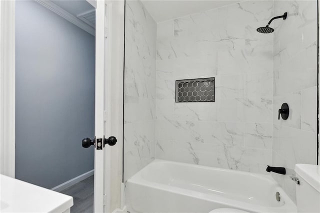 672 Wiegand Dr, Westwego, LA 70094 - bathroom with toilet, shower / bath combination, baseboards, wood finished floors, and ornamental molding