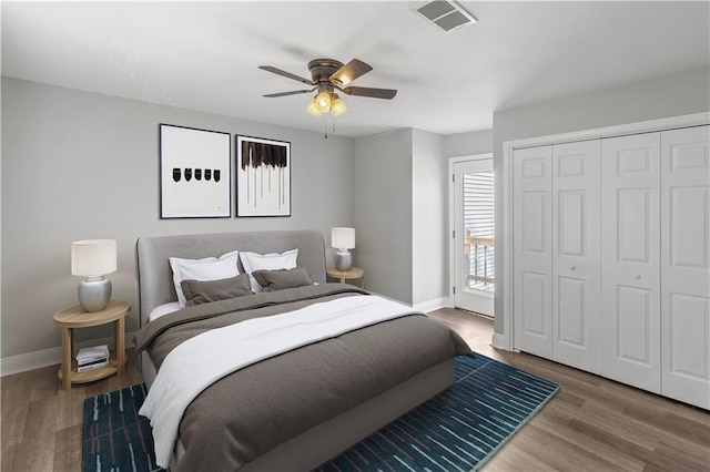 112 Napoleon Ave Unit 30, Slidell, LA 70460 - bedroom with baseboards, wood finished floors, a ceiling fan, and a closet