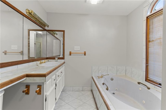 112 Napoleon Ave Unit 30, Slidell, LA 70460 - full bath with a jetted tub, vanity, tile patterned flooring, and baseboards