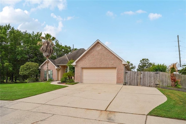 119 Kasey St, Slidell, LA 70458 - view of front of property featuring brick siding, concrete driveway, and an attached garage