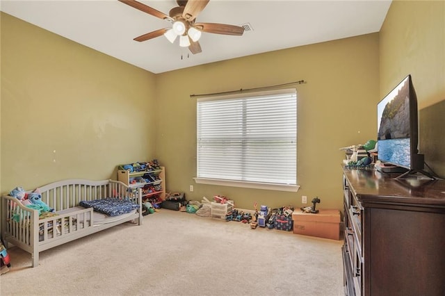 119 Kasey St, Slidell, LA 70458 - carpeted bedroom featuring a nursery area and ceiling fan
