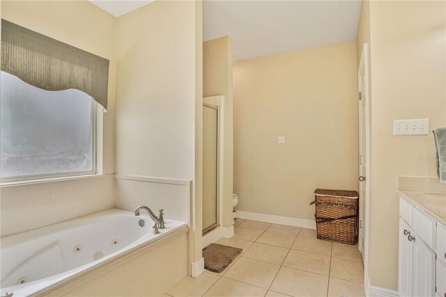 119 Kasey St, Slidell, LA 70458 - full bath with a shower stall, tile patterned floors, vanity, a jetted tub, and toilet