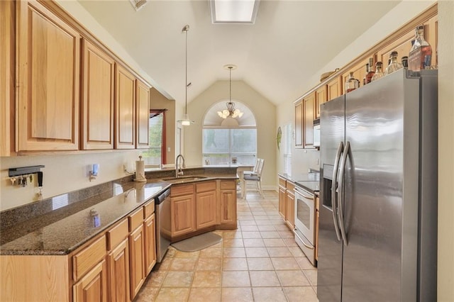 119 Kasey St, Slidell, LA 70458 - kitchen with stainless steel appliances, a sink, lofted ceiling, a chandelier, and a peninsula