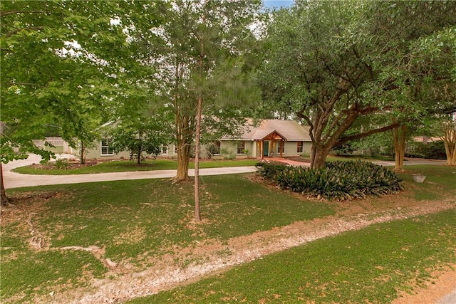 156 Oak Holw, Hammond, LA 70401 - view of front of property with driveway and a front yard